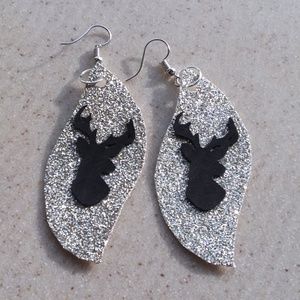 Large, silver sparkle dangle earrings with deer
